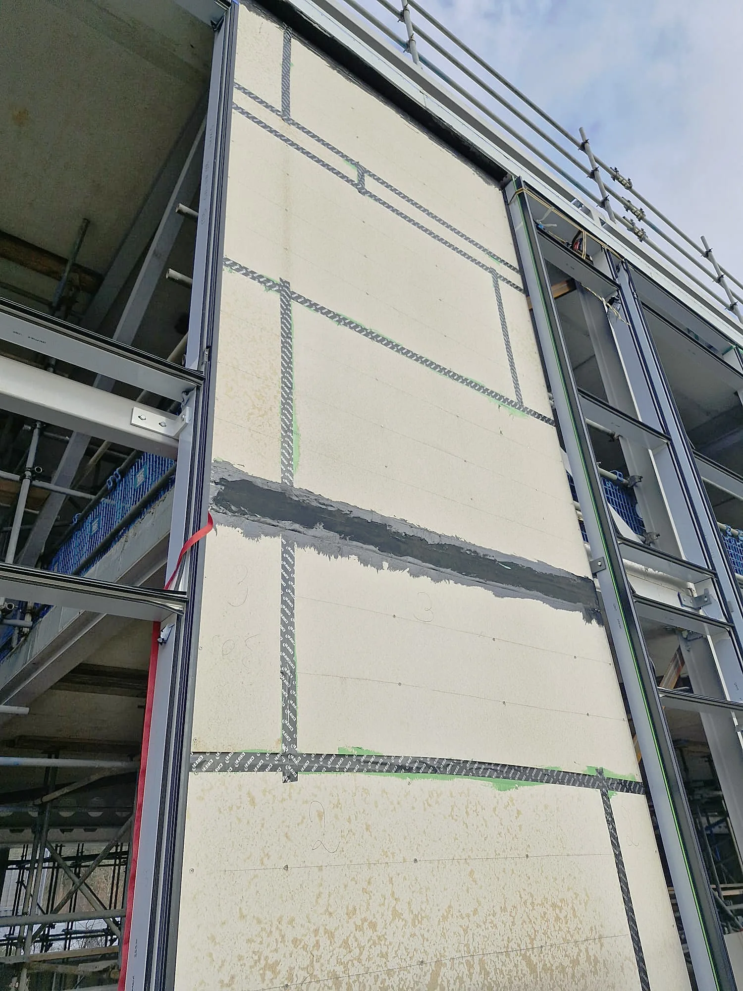External wall boards with taped joints seen from below